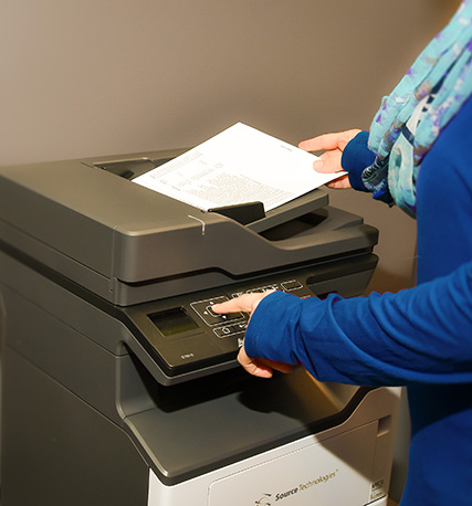 Source Technologies MICR Printer printing a secure document